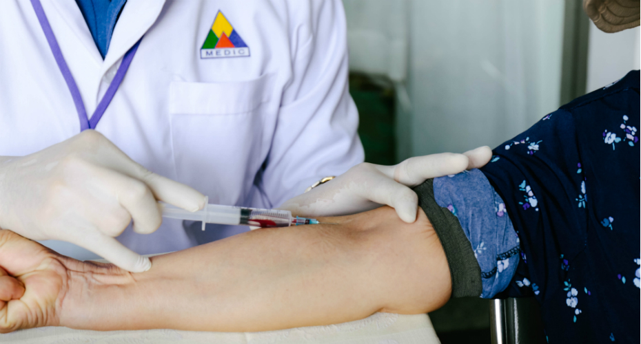 Close up on someone taking a blood sample