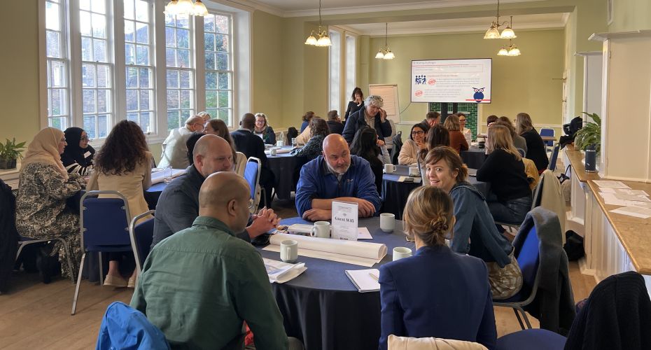 People sitting around a table talking
