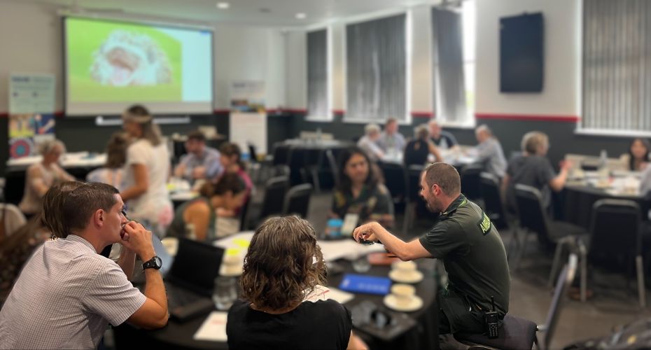 People sitting around a table talking